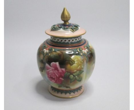 A Royal Worcester Vase and cover in Hadley style, painted with pink and yellow roses below a pierced gallery rim  Shape 278HD