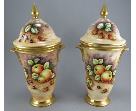 A pair of Peter Gosling hand-painted fine bone china lidded vase. Both decorated with fruit in the manner of Royal Worcester.