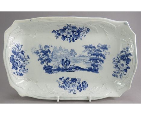 An early nineteenth century blue and white transfer-printed Turner Villagers pattern moulded dessert dish, c. 1825. It is mar