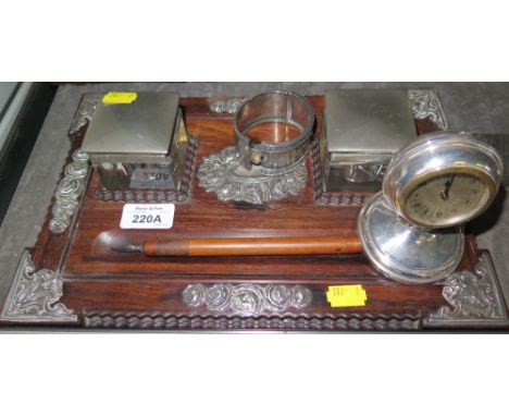 A 19th century rosewood desk stand, with floral silver mounts, possibly Low Countries, rectangular with ripple moulded sides,