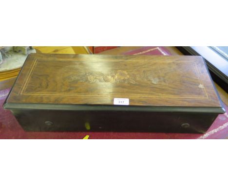 An inlaid rosewood cased Swiss cylinder music box, by P.V.F, the 13" cylinder playing 12 airs, a.f.