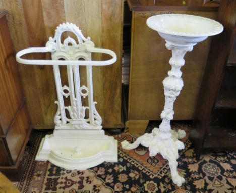A cast iron jardiniere stand, of baluster and foliate form on a tripod scrolling base, 74cm high
