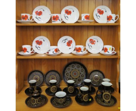A Denby ware Arabesque pattern tea/coffee service, with six tall cups and saucers, and a Wedgwood corn poppy pattern tea serv