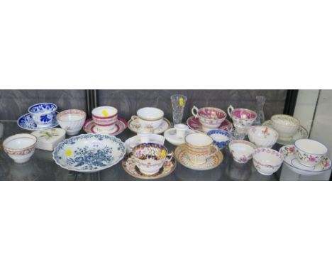 An 18th century blue and white tea bowl depicting a Chinese scene, other 18th century and 19th century tea bowls, cups and sa