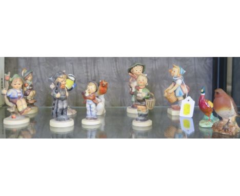 Seven Hummel children figures, another two of birds and two Beswick bird figures (11)