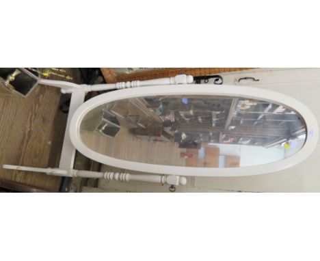 An oak oval wall mirror with bevelled plate, 60cm wide and a painted wood cheval mirror (2)