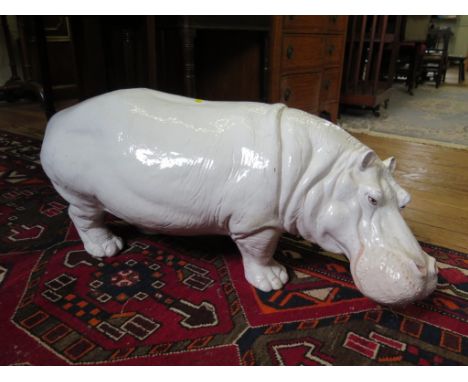 An Italian ceramic model of a white hippopotamus, 84cm long 