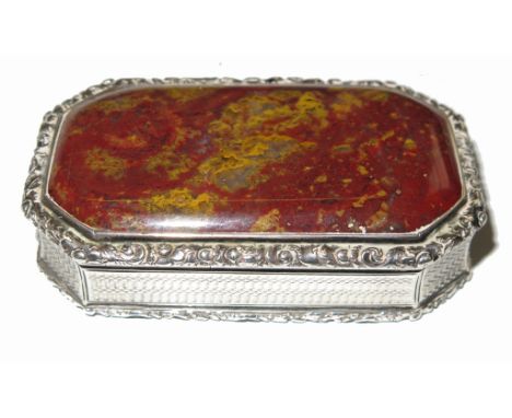 A William IV silver and red agate snuff box, of rectangular form with canted corners, with scroll edges and engine turning, g