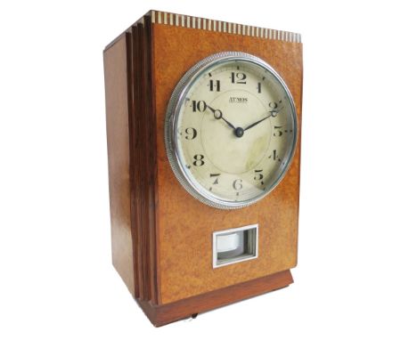 A rare early 1930's burr amboyna Atmos pendule perpetuelle clock by J.L. Reutter, the step sided case with ivory dentil inlay