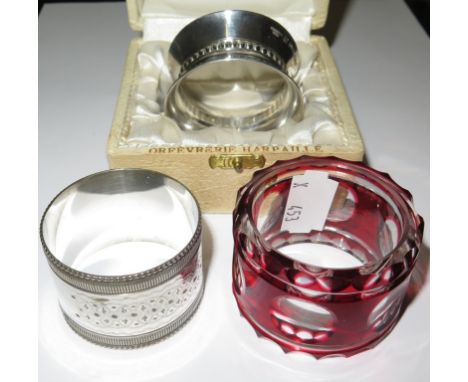 Vintage Christophle Gallia silver plated napkin ring in original box, together with another silver plated napkin ring and a r