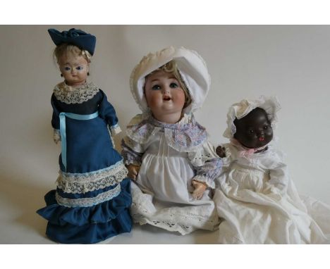 Three antique dolls, comprising a 17" Schutzmeister &amp; Quendt 201 9 bisque socket head doll, with sleeping eyes, open mout