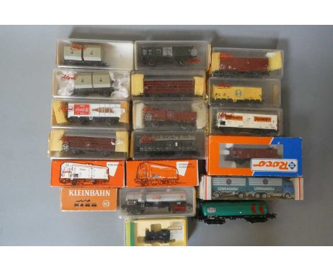 Seventeen HO scale goods rolling stock by Lilliput, Roco and others including beer vans, coal wagons, tank wagon, electrical 