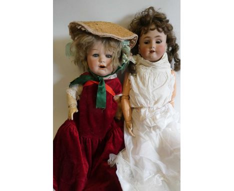 Two German bisque socket head dolls, comprising a 24" Jutta 1914 13 doll with sleeping eyes, open mouth and bent limb body, a