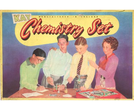 Kay Chemistry Set with 16 chemicals and laboratory equipment and a small Merit student microscope, both items boxed, good (Es