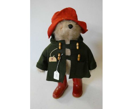 Vintage Paddington bear, with green felt coat, red felt hat, red Dunlop boots and tag, 18" (Est. plus 24% premium inc. VAT)Co