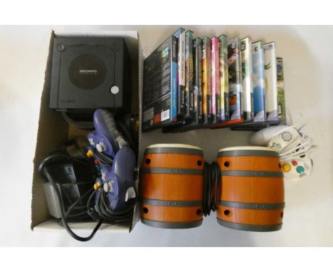 Nintendo Game Cube, 12 games and accessories, including DK Jungle Beat, Mario Kart Double Dash, Super Mario Sunshine, Star Wa
