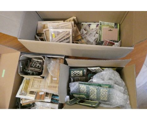 Three boxes of doll's house building items, including vintage metal windows and doors, modern wooden windows and doors, a sta