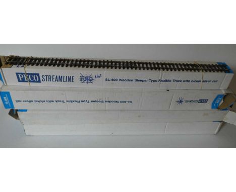 Sixty eight lengths of used PECO fine scale SL700 Gauge 0 flexible track. This track has been removed from an unbalasted gard