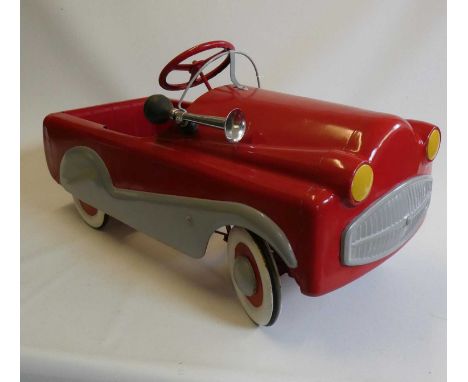 A Mobo pedal car, 1950s, with painted metal body, manual horn and wire windshield, 36" x 14 1/2", good restored condition (Es