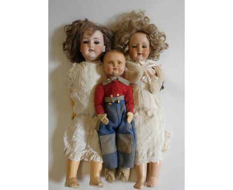 Three vintage dolls, comprising a 24" Armand Marseille 390n 9 with sleeping eyes, open mouth, teeth and jointed body, a 22 3/