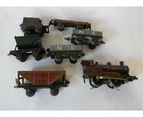 Marklin electric locomotives, tender missing, and five Marklin goods wagons, fair to poor (Est. plus 24% premium inc. VAT)