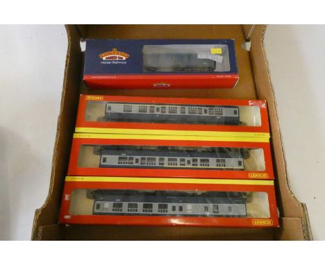 Three Hornby BR blue/grey passenger coaches and Bachmann BR blue weathered parcels van, all items boxed, excellent (Est. plus