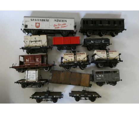Twenty 0 gauge goods wagons, most from plastic kits or Hornby wagons, well-made lettered in private owner or railway company 