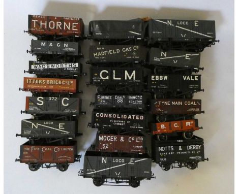 Twenty 0 gauge open coal wagons, most from plastic kits or Triang wagons with well lettered private owner or railway company 
