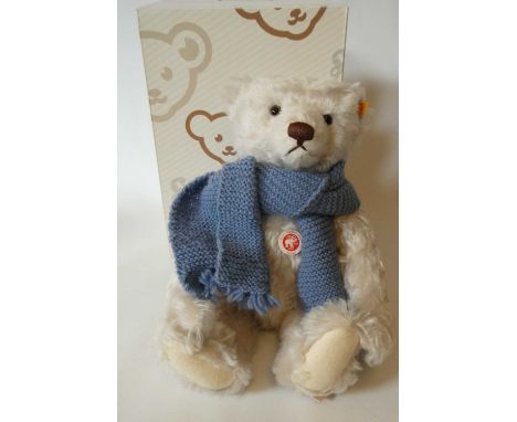 A Steiff Classic 42 pink teddy bear, with blue knitted scarf, labels and Steiff box (Est. plus 24% premium inc. VAT)Condition