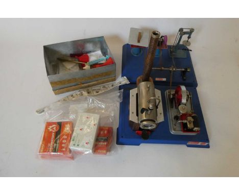 Wilesco D10 steam engine with three workshop machine tools and a quantity of fuel tablets and accessories, shows signs of lit