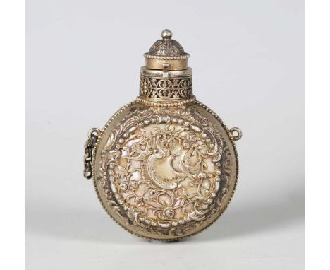 A late 19th century French white metal and mother-of-pearl perfume flask with pierced foliate and filigree body, length 6.5cm