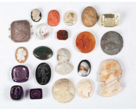 A collection of mainly late 18th and 19th century hardstone, glass and shell intaglio carved seals and tablets, including a f