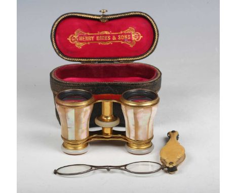 A pair of late 19th/early 20th century French gilt brass and mother-of-pearl telescopic opera glasses, the eyepieces detailed