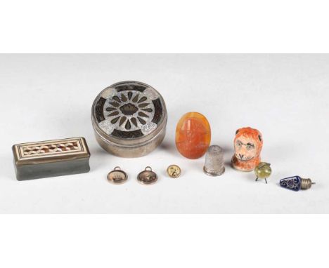 A 19th century carved cornelian intaglio portrait of Napoleon Bonaparte, 4cm x 2.8cm, a silver and tortoiseshell cylindrical 