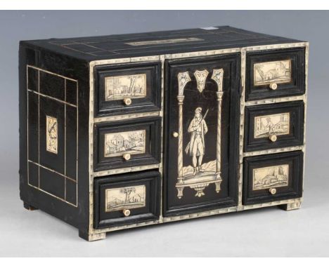 An 18th/19th century ebony and ivory inlaid Portuguese style table-top collector's chest, fitted with a door flanked by drawe