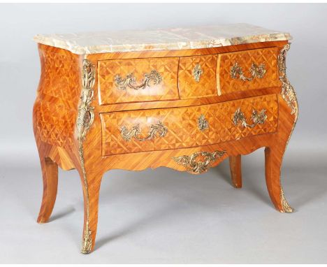 A good 20th century Louis XV style parquetry kingwood three-drawer commode of shouldered bombé form with marble top and gilt 