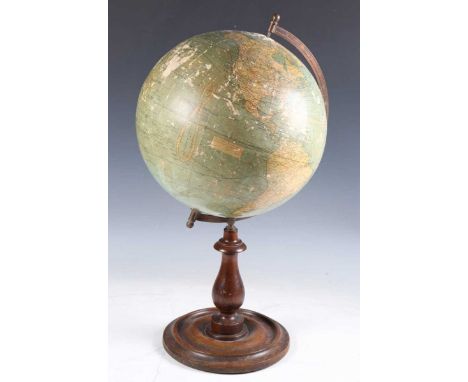 A 'Bacons 12-inch Excelsior Globe', raised on a stained beech stand, height 57cm.