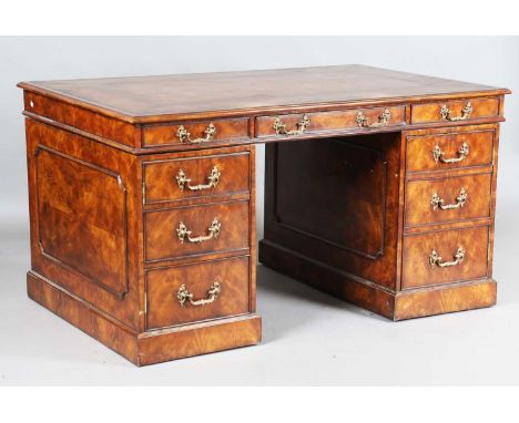 A modern George III style mahogany twin-pedestal desk, manufactured by Theodore Alexander after a design by Thomas Chippendal