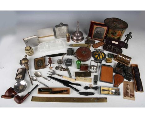 A large collection of mixed collectors' items, including a cased ambrotype, a plated wine funnel and various curling tongs.