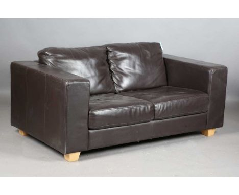 A modern brown leather sofa by John Lewis, height 62cm, width 159cm, depth 91cm.