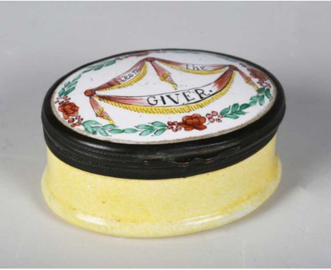 A 19th century Bilston enamel oval box, the inscribed lid above a yellow body, containing a piece of claret velvet and an ins