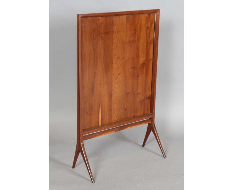 A mid-20th century yew firescreen, in the manner of Edward Barnsley, height 77cm, width 48cm.
