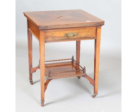 An Edwardian rosewood and boxwood line inlaid envelope card table, height 69cm, width 56cm, depth 56cm.
