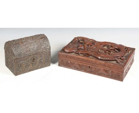 A late 19th century Singaporean carved wooden box, profusely carved with overall dragons, width 30.5cm, together with a domed