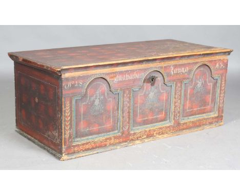 A 19th century Swiss painted pine trunk, the triple-panel front with inscription and date, height 47cm, width 117cm, depth 57