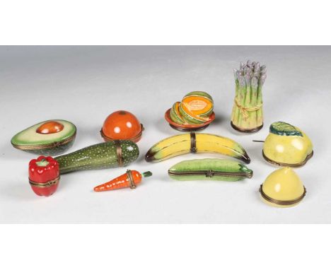 A group of eleven modern porcelain and enamel trinket boxes, all modelled as a piece of fruit or vegetable, mostly Halcyon Da