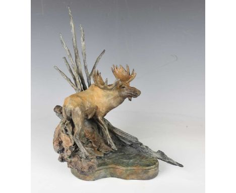 Sherry Sander - a modern American limited edition green patinated cast bronze model of a moose on a river bank, bearing cast 