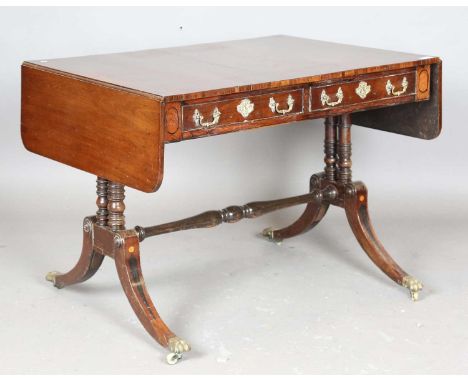 A Regency mahogany sofa table, fitted with two frieze drawers, raised on inlaid sabre legs, height 70cm, width 96cm, depth 70