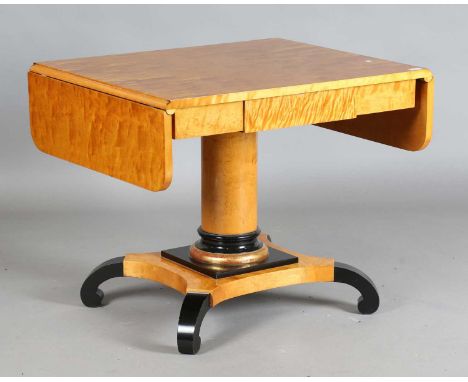A 20th century Biedermeier style maple and ebonized sofa table, height 72cm, unextended width 90cm, depth 72cm.