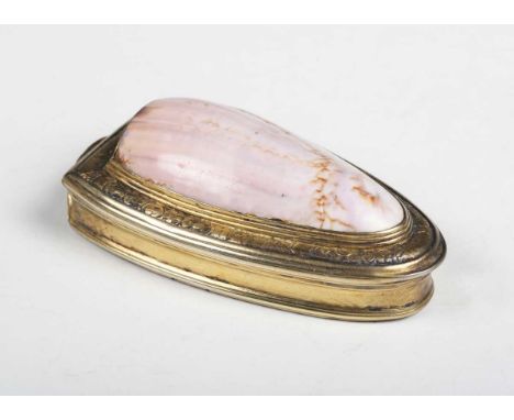 A late 18th/early 19th century silver gilt snuff box with seashell inset lid and tortoiseshell base, length 8cm.